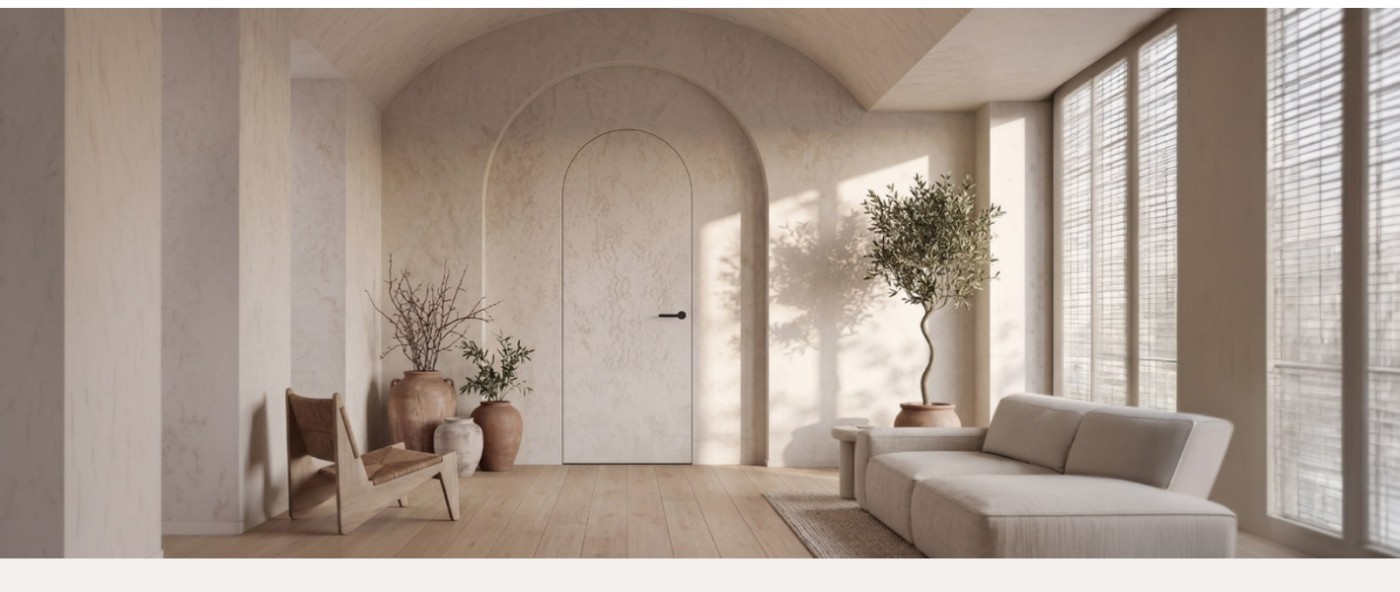 Onzichtbare boogdeur in een warm interieur